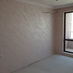 Мазилка Оточенто в розовата гама за спалня