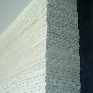 Врачански камък по стената на частен имот